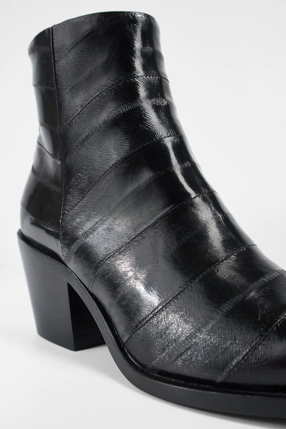 AUSTIN onyx-black texan boots.