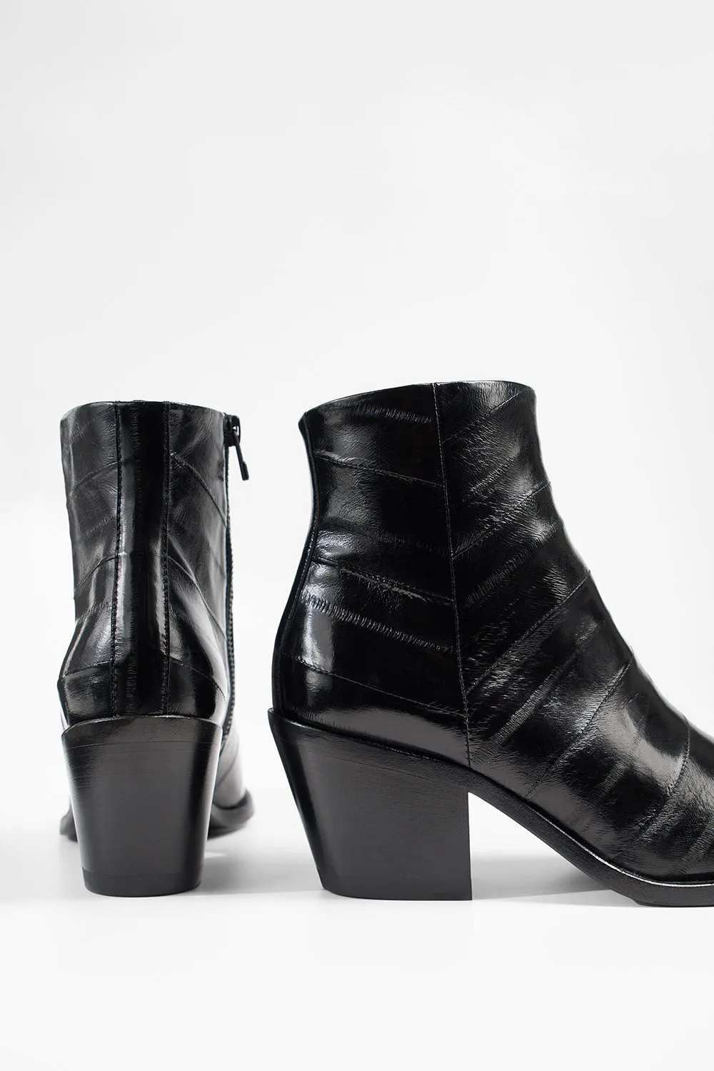 AUSTIN onyx-black texan boots.